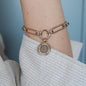 Armband, Reliefmynt, G